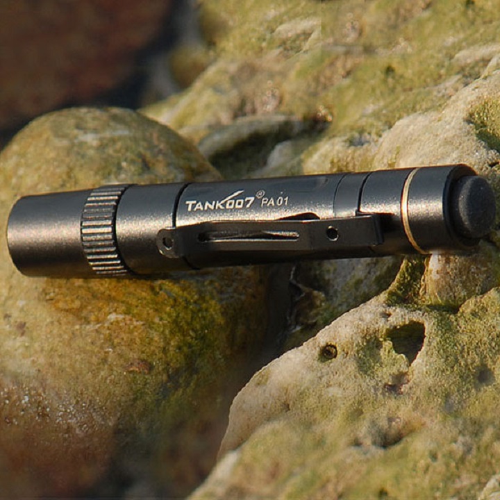 picture of pocket flashlight on rocks
