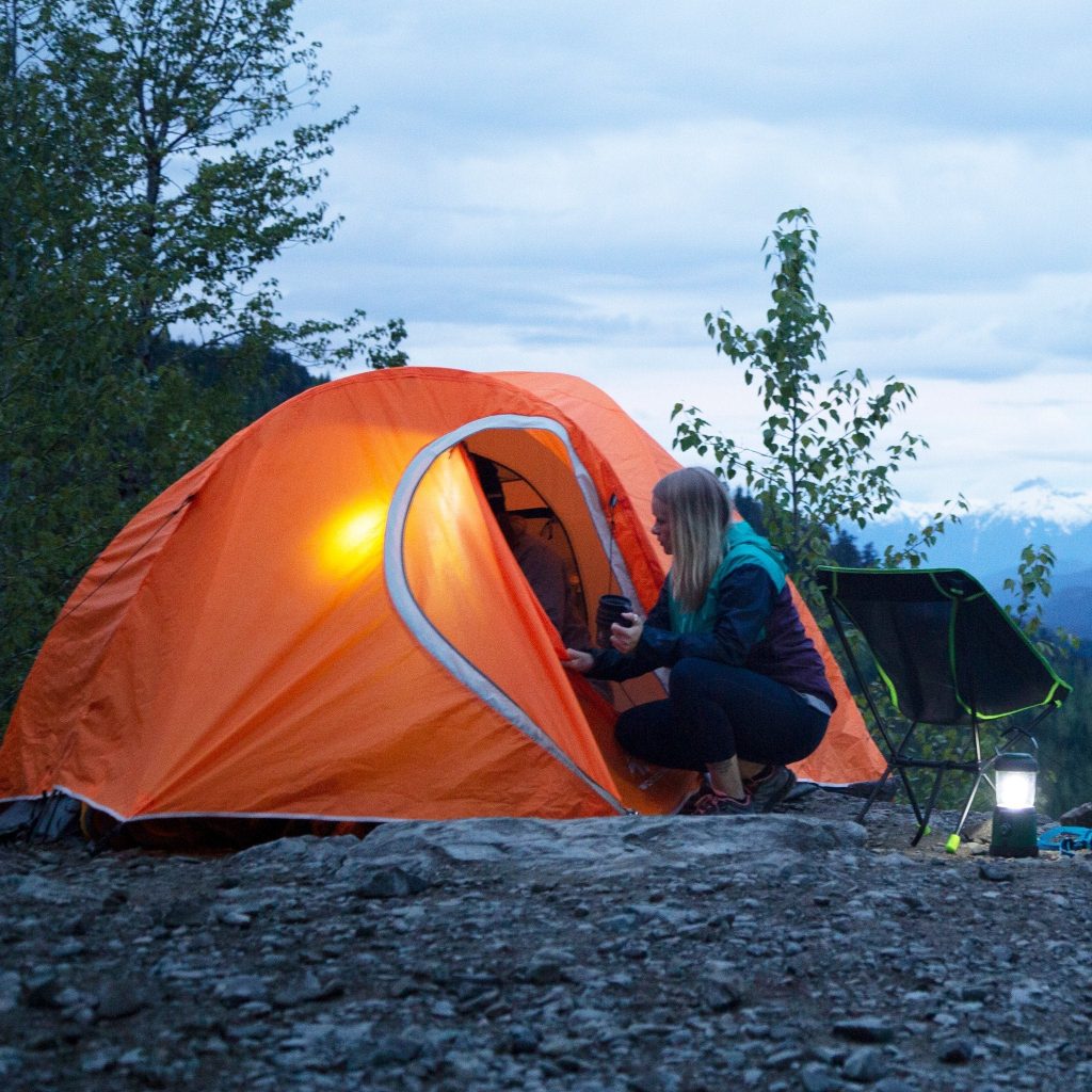 Woman Entering into 4-Person Tent 