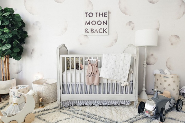 nursery decorated with moon kids wallpaper 