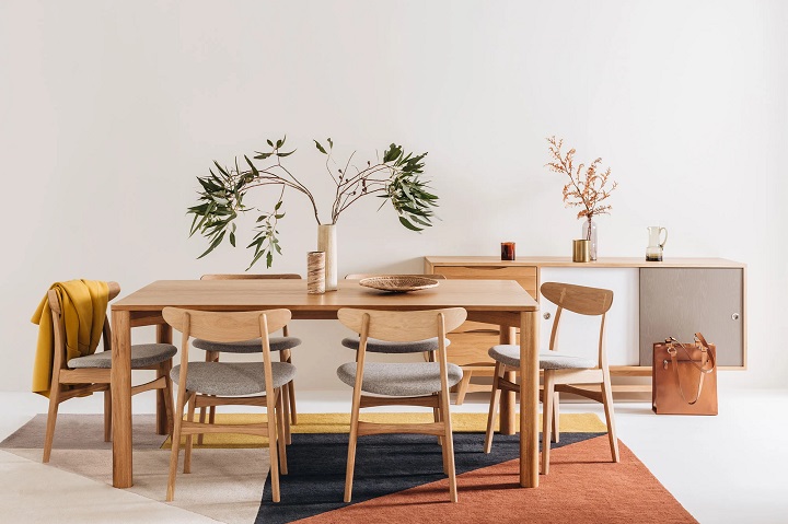 dining room with comfortable chairs and luxury designer serware