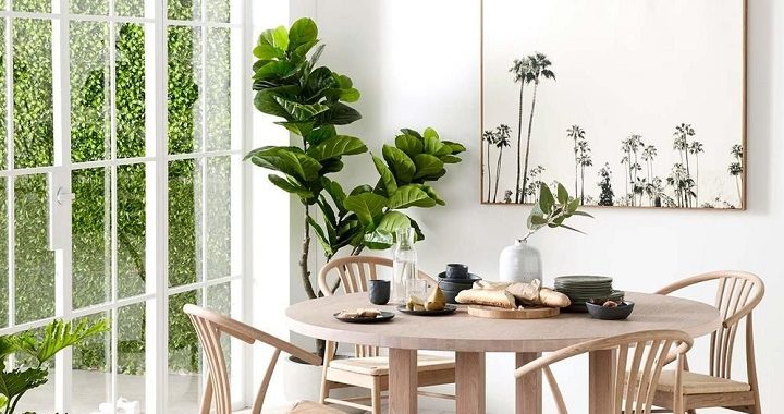 dining room with greenery and luxury decor like designer serveware