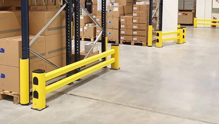 Yellow pallet racking frame end protectors in a warehouse